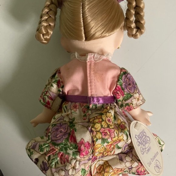 Vintage Precious Moment cute girl . April. 2000,stain on dress.
9” - Picture 4 of 7